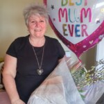 A very happy mum with Mothers Day Gifts