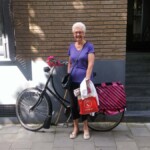 Oooh, take a picture of me by the bike she said, with the lovely flowers.