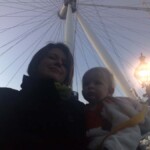 Mum looking forward to going on the big wheel