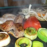 The Teppanyaki grill is doing a good job here of grilling up those veggies.