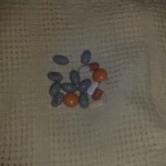 The little grey ones are Cyclosporine, an immunosuppressant (anti-rejection) drug. The others, no idea.